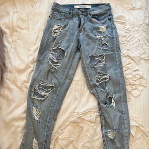 Brandy Melville Distressed with holes jeans size 25.